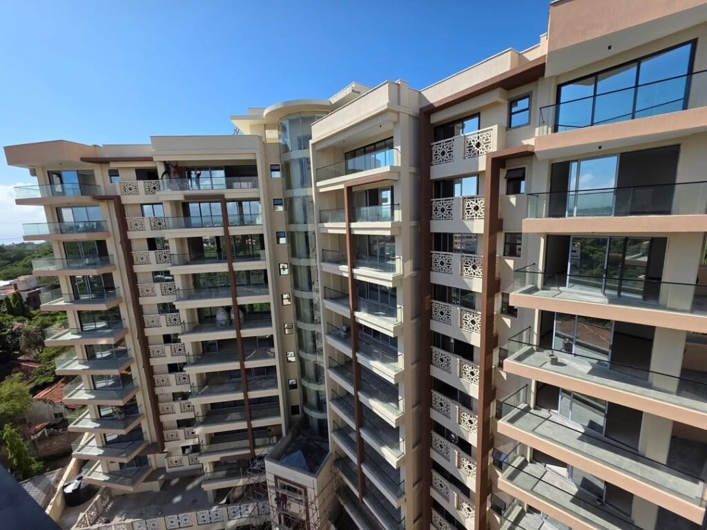 A modern mid-rise building featuring 2-bedroom apartments for rent in Nairobi, Kilimani, near social amenities.